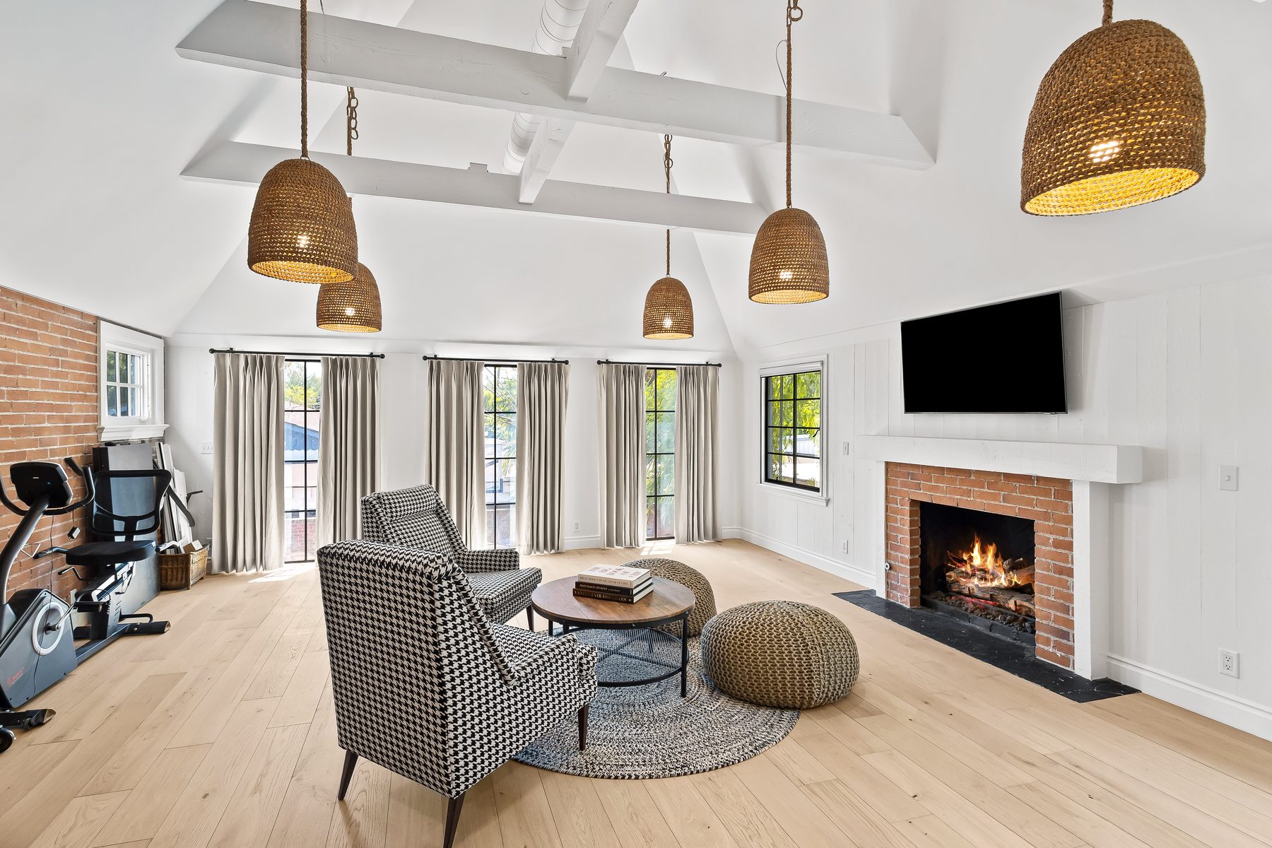 Upstairs bonus room with fireplace